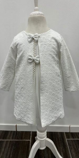 Robe blanche à motifs pour bébé chez Keya mariage Mulhouse