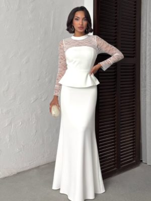 Robe longue blanche avec manches en dentelle chez Keya mariage Mulhouse