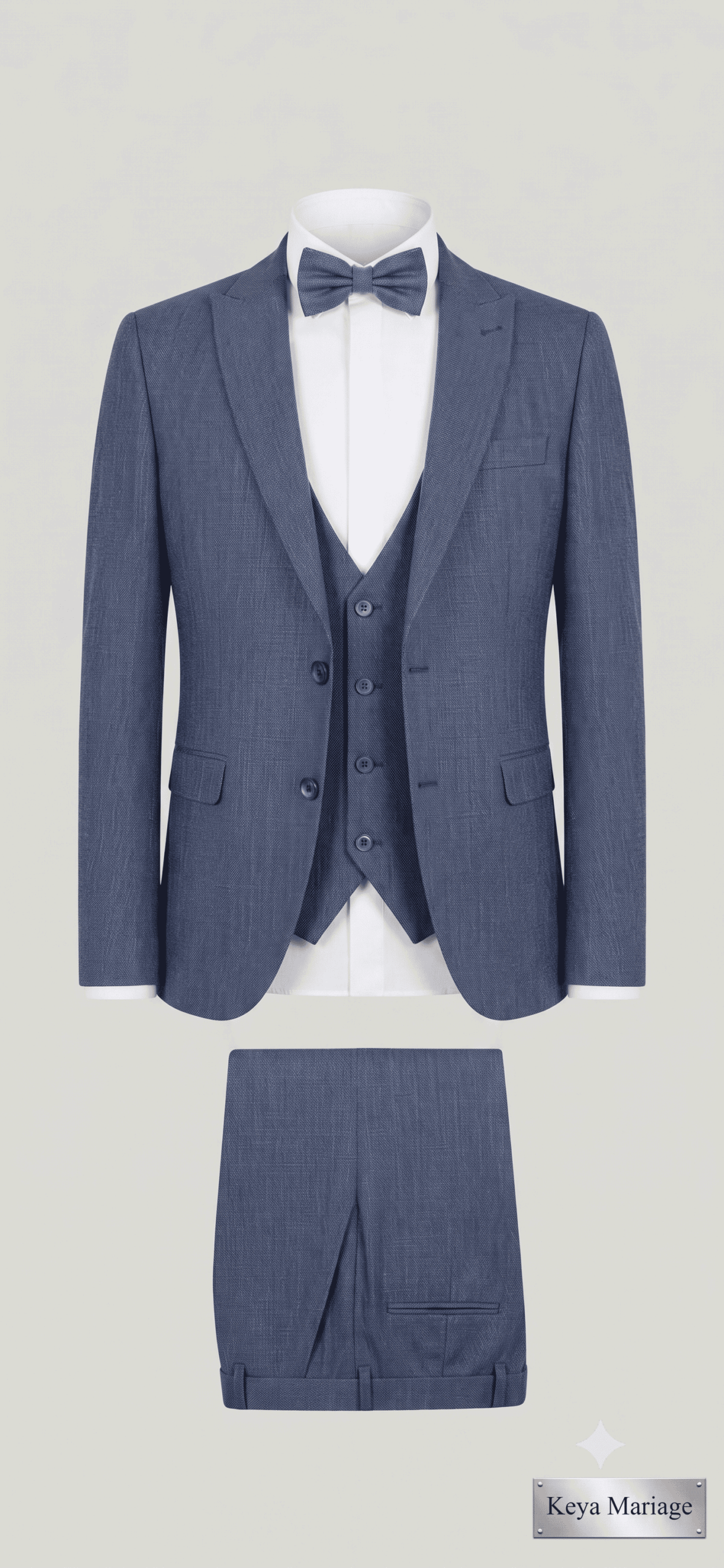 Homme portant un costume 4 pièces bleu chiné avec chaussures marron, style moderne et élégant pour mariage - Keya Mariage